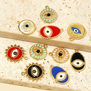 Gold-plated stainless steel evil eye pendants with colorful enamel details in various shapes