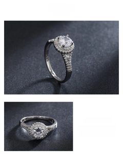 Macro detail of S925 sterling silver ring showing halo diamond setting and hallmark