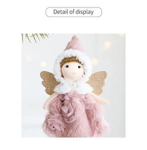 Detail of pink plush angel ornament with sequin wings and pearl embroidery