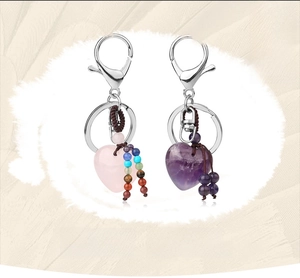 Detailed close-up of handmade heart natural stone keychains with beaded tassels