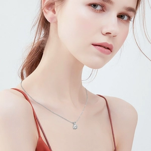 Classic 1 carat moissanite solitaire necklace with S925 sterling silver chain on model
