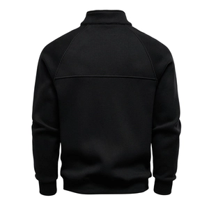Detail view of the black ribbed texture on the back of a men's stand-collar knitted jacket
