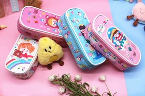 Detail of cute waterproof cartoon pencil cases in pastel pink and blue leather material