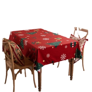 Festive red Christmas tablecloth with green tree and white snowflake prints for dining tables