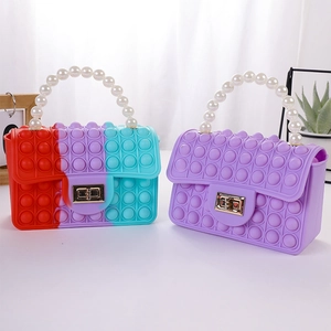 Kids silicone pop fidget shoulder bag with gradient colors and white pearl handle
