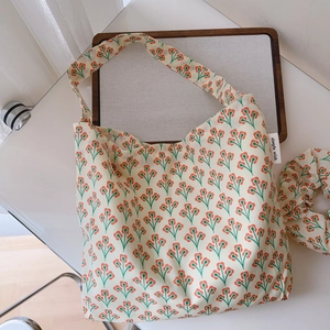Floral cotton tote bag and matching scrunchie set in vintage orange flower pattern