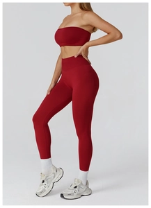 Detail of burgundy seamless yoga set with high-waist leggings and bandeau sports bra
