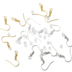 Detailed view of gold and silver metal earring hooks with clear silicone backs for DIY jewelry