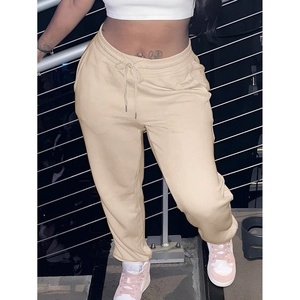 Detailed view of beige high waist drawstring joggers with elastic cuffs for women