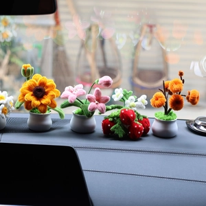 Handmade crochet sunflower and strawberry car dashboard ornaments in white pots
