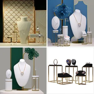 T-bar jewelry display stand with velvet bust and metal frames for earrings and necklaces