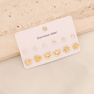 6 pairs of stainless steel earrings set featuring hearts and crystals on stone backdrop