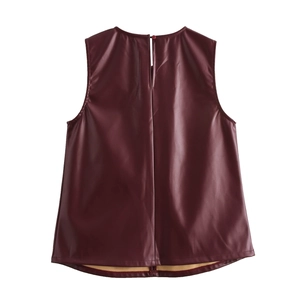 Back view of burgundy sleeveless faux leather top with keyhole closure and curved hemline