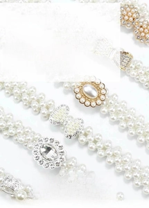 Detail of elegant pearl belts for dresses featuring rhinestone floral and bow buckles