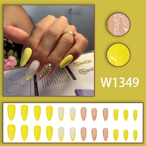 24pcs yellow French almond press-on nails with silver glitter and glossy finish