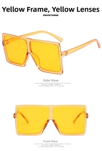 Detail view of oversized yellow square sunglasses with translucent resin frames