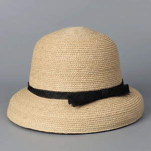 Elegant Raffia straw hat with a black mesh bow ribbon for beach sun protection