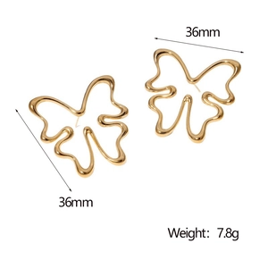 Detailed view of gold butterfly earrings with dimensions 36mm and 7.8g weight