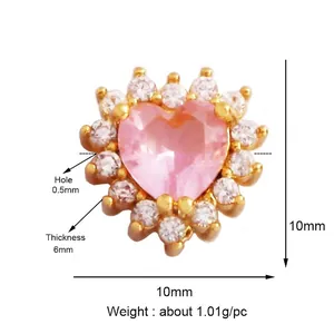 Pink heart zircon charm with gold plating and crown setting detail, 10x10mm size