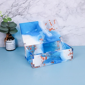 Detail of blue and white epoxy resin storage box with gold foil and flip-top lid