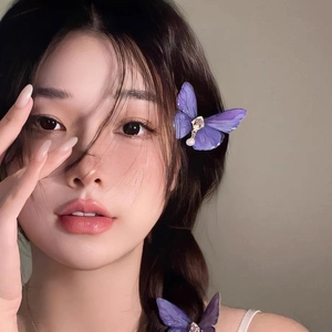 Elegant purple butterfly hair clip with pearls and ribbons for Asian style hairstyles