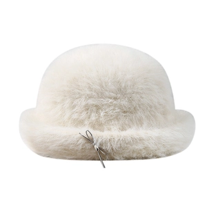 Elegant white faux rabbit fur bucket hat with delicate silver bow and soft plush texture