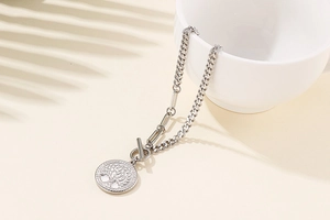 Pendentif Arbre de Vie argenté avec fermoir à bascule sur chaîne mixte et tasse en céramique