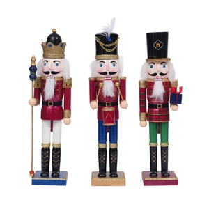 Three traditional 38cm wooden nutcracker soldiers in red and gold for Christmas decor