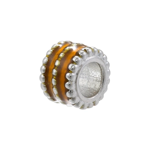 Macro detail of silver-plated copper spacer bead with amber enamel and 18K gold accents