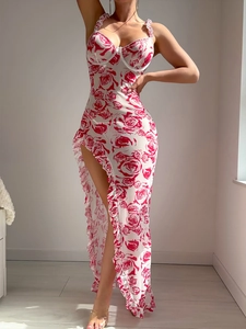 Detail view of floral slip dress featuring high slit and ruffled heart-shaped neckline