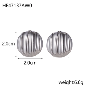 Detailed view of silver-tone ridged sphere earrings with 2.0cm size measurement