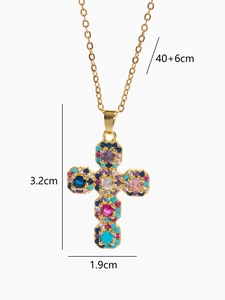 Detailed view of colorful zircon cross pendant showing dimensions 3.2cm x 1.9cm and chain