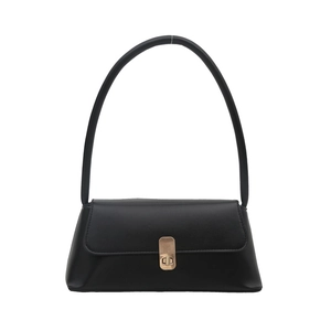 Elegant black leather baguette bag with a gold metal clasp and single handle in minimalist style