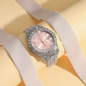 Macro view of full crystal silver watch with pink dial and Roman numeral date display