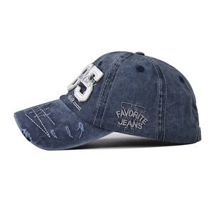 Vintage washed navy denim baseball cap with 85 embroidery and distressed details
