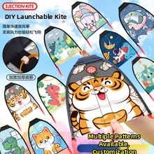 Close-up of DIY ejection kite featuring durable wide elastic bands and cartoon patterns