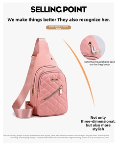 Detail of pink nylon chest bag showing quilted pattern and external headphone port