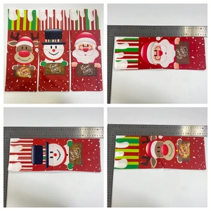 Detail view of festive wine bottle bags with measurements showing the 30cm fabric height