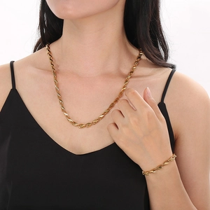 Elegantes goldenes Melonenkern- und Rautenketten-Halsketten-Set mit Armband