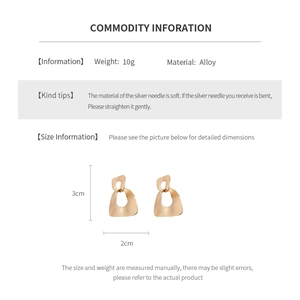 Detail specifications of golden geometric alloy earrings with silver needles 3x2cm size