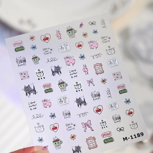 Detail of hand-drawn Korean style nail art stickers with cute cats and bows M-1189