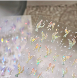 Detail of 3D aurora laser nail stickers with butterfly and star shapes for nail art decor