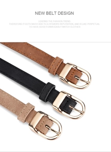 Detailed view of three thin PU leather belts in brown, black, and beige with gold D-buckles