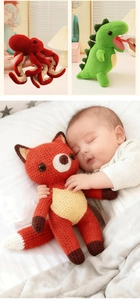 Detail of handcrafted crochet animal plush toys including fox, octopus, and dinosaur