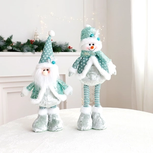 Detail of mint green Christmas gnome plush dolls with sequins and striped fabrics