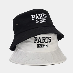 Black and white cotton bucket hats with Paris French embroidery in a minimalist style