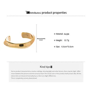 Irregular wave acrylic cuff bangle in gold finish with product dimensions and specs