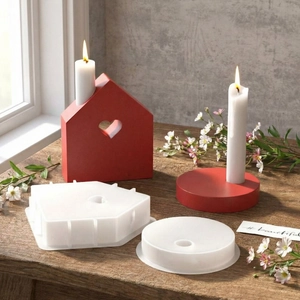 Macro detail of house-shaped silicone mold with heart cutout for DIY candle making