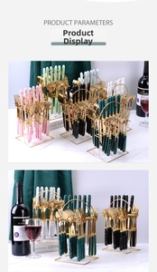 Detail of marble pattern stainless steel cutlery set with gold plated finish and rack