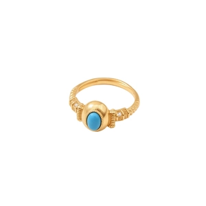 Vintage gold-plated ring with oval blue turquoise stone and zircon accents on white background